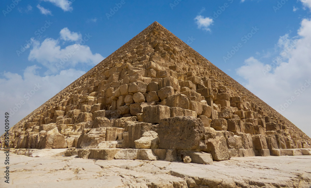 Egyptian pyramids in sand desert and clear sky