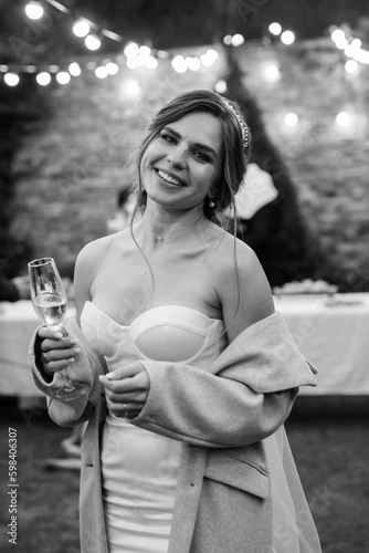 Tablou pe pânză cheerful young bride at a banquet