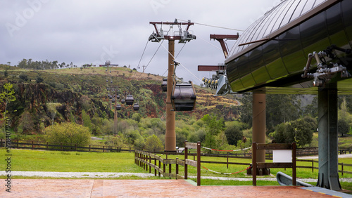 Cable car above the animal park, photo of the entry point of the green cable car.  Public transport in the park .funicular  cabárceno