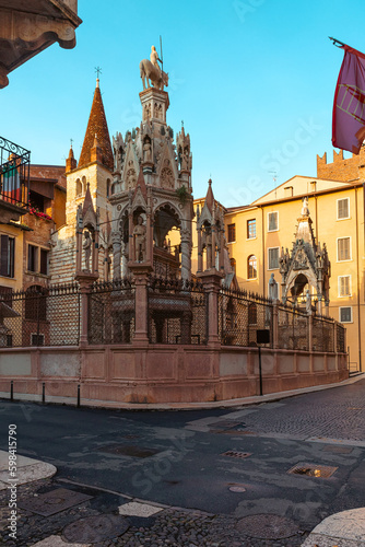 Medieval street in old town of Verona with Scaliger tombs. Gothic monuments. Touristic landmark. Vertical orientation