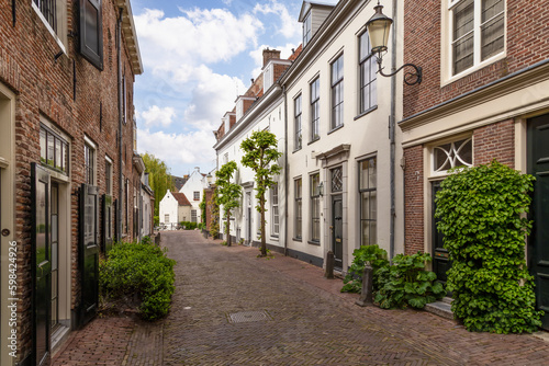 Narrow street with medieval houses in the historic center of Amersfoort. © Jan van der Wolf