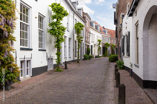 Narrow street with medieval houses in the historic center of Amersfoort.