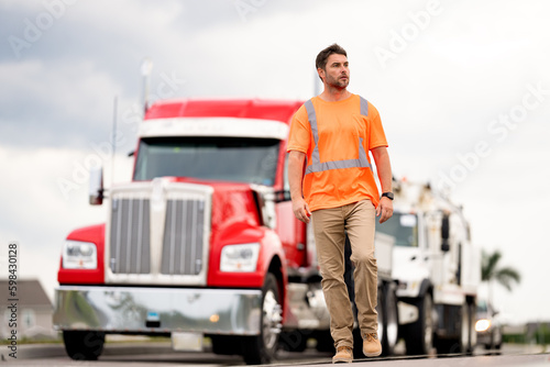 photo of truck driver walking outdoor with logistics concept, advertisement