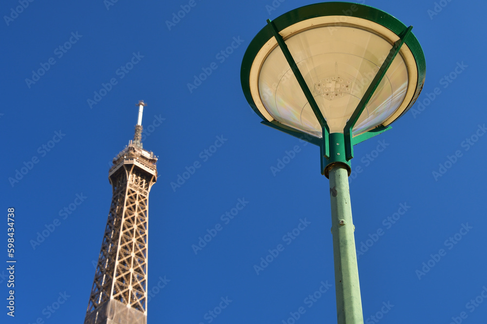 Paris, France. Eiffel Tower and street lights. February 28, 2021.