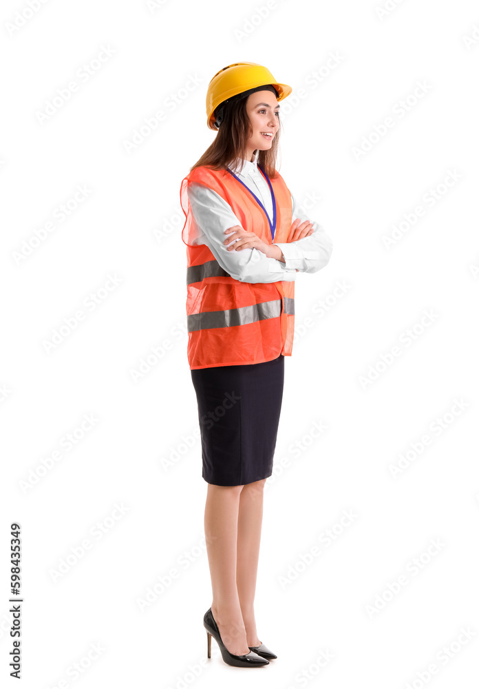 Female worker in vest and hardhat on white background Female worker in vest and hardhat on white background