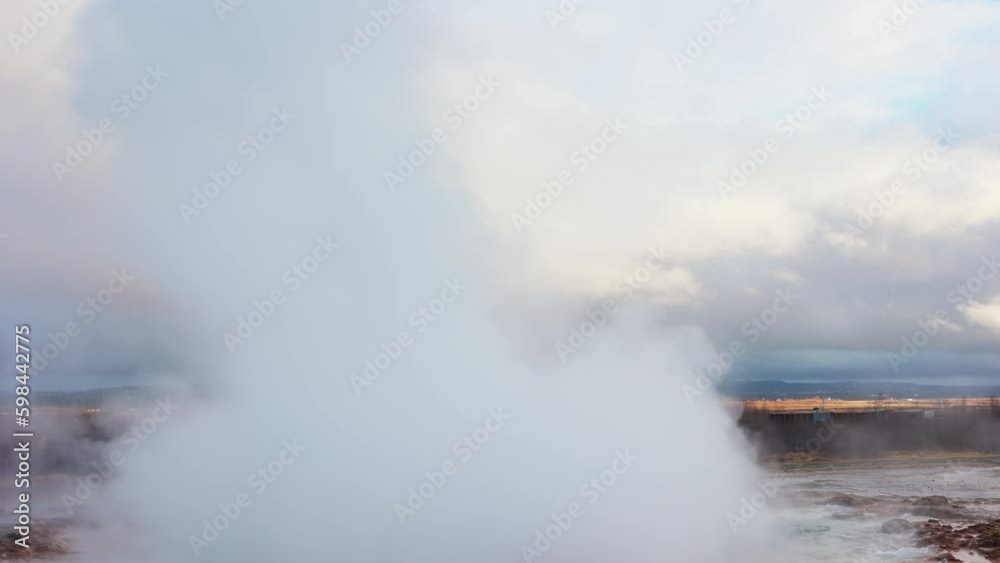 Scandinavian geyser in iceland near reykjavik city, holes erupting with hot water splash and steam. Beautiful fountain in crater, nordic outdoor landscape scenery. Handheld shot. Generative AI Scandinavian geyser in iceland near reykjavik city, holes erupting with hot water splash and steam. Beautiful fountain in crater, nordic outdoor landscape scenery. Handheld shot. Generative AI