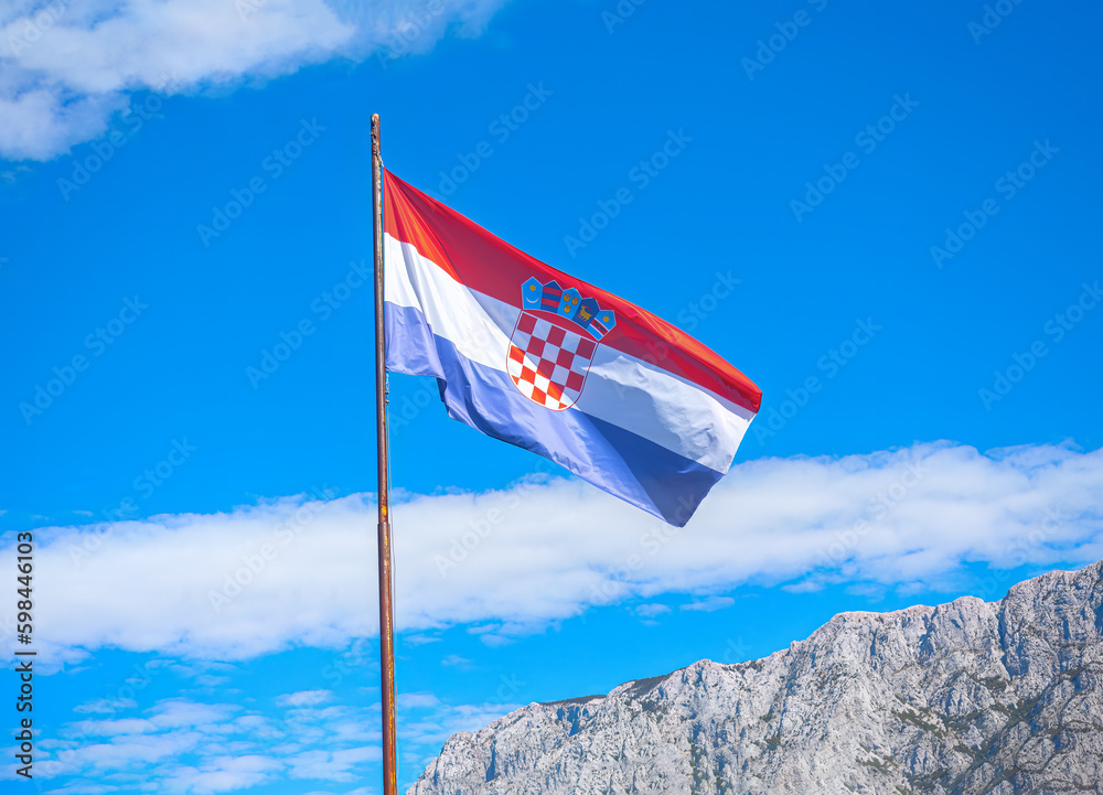Croatia flag over Balkans Mountains . European country flag