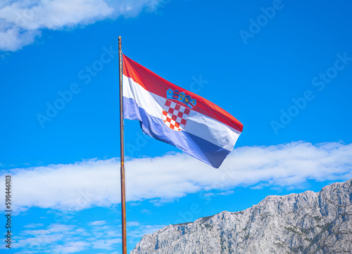 Croatia flag over Balkans Mountains . European country flag 