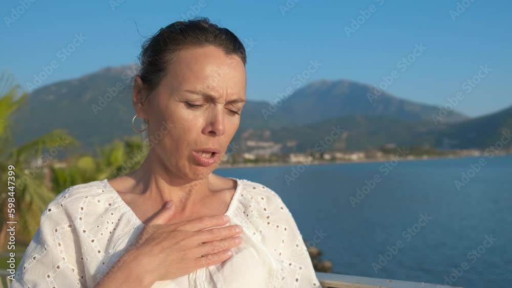 A woman with an asthma attack at a resort. A sick woman is choking and using an aerosol inhaler. Generative AI A woman with an asthma attack at a resort. A sick woman is choking and using an aerosol inhaler. Generative AI