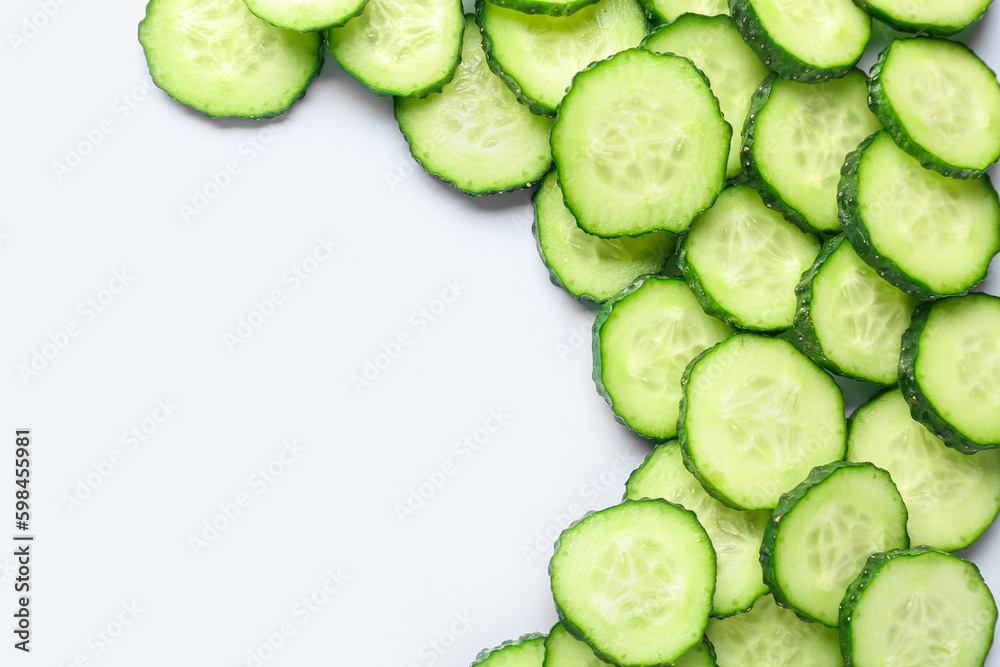 Slices of cucumber on blue background Slices of cucumber on blue background
