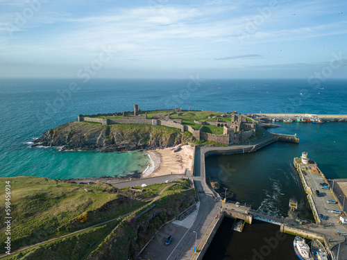 aerial view at St. Patrick's Isle and Peel Castle from above Peel harbor