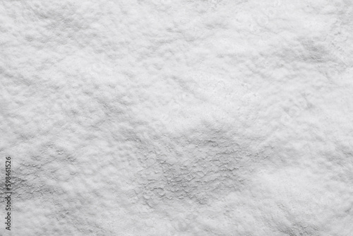Heap of natural starch as background, top view