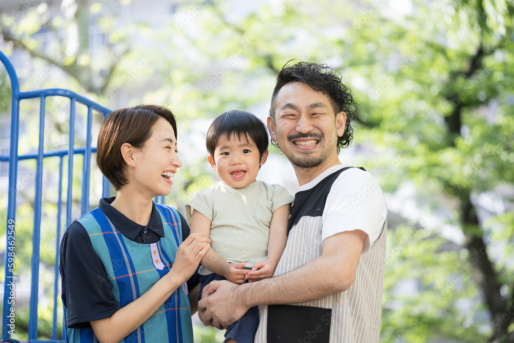 Image of a childcare worker and a preschooler that could be used in childcare or babysitting Looking at the camera Image of a childcare worker and a preschooler that could be used in childcare or babysitting Looking at the camera