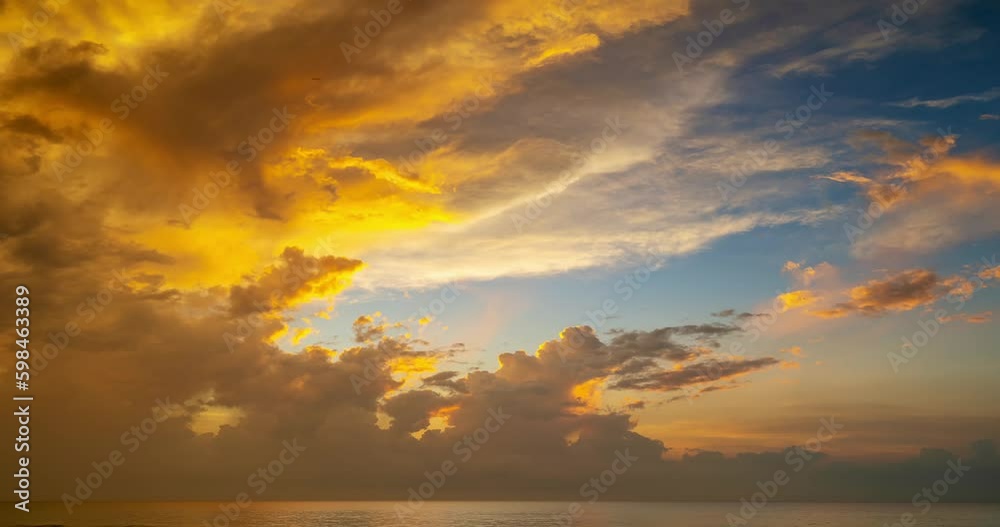 Dramatic dark clouds background,Beautiful 4K Time lapse of Majestic sunrise or sunset clouds sky landscape,Amazing light of nature cloudscape sky and Clouds moving away rolling,Dark cloud timelapse
