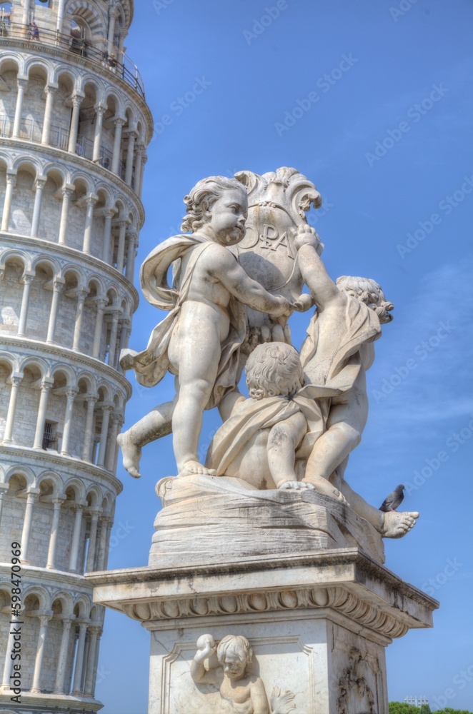 Statue and Leaning Tower of Pisa