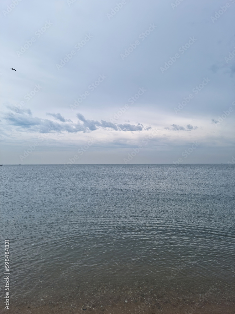 sea ​​water and gray sky