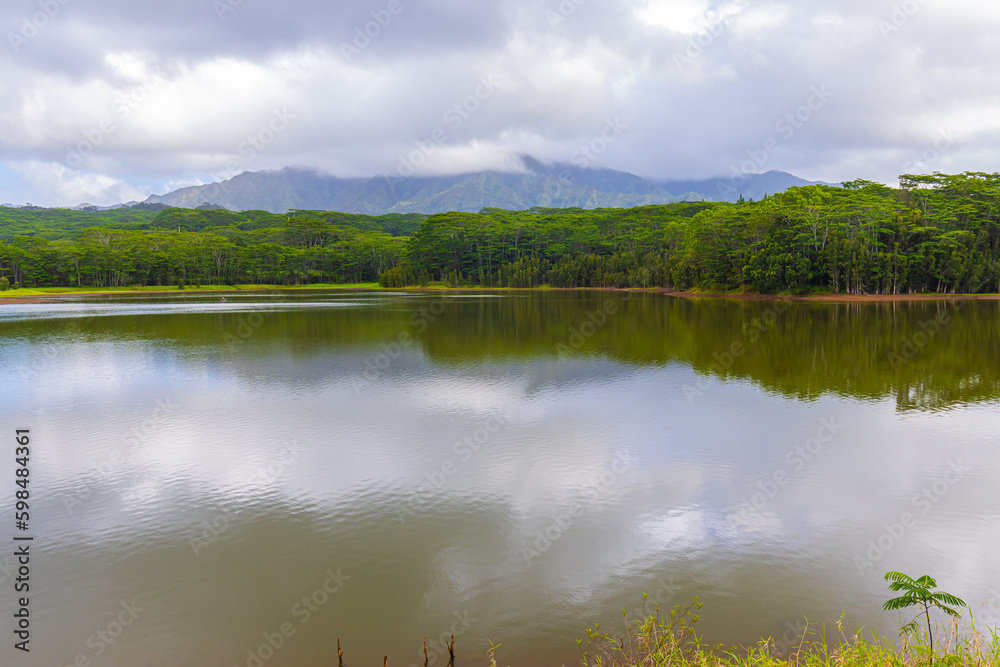 Cloud Covered Mountains Reflection In The Wailue Reservoir, Wailua Homesteads, Kauai, Hawaii, USA