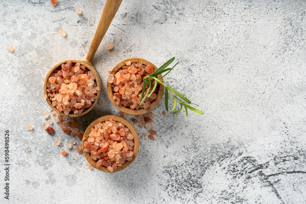 Himalayan pink salt is herb seasoning isolated on white abstract background with copy space Himalayan pink salt is herb seasoning isolated on white abstract background with copy space