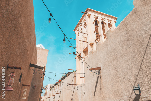 Photography Al Fahidi district streets and traditional arab wind tower used for ventilation
