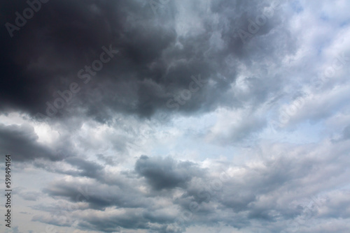 Fototapeta Naklejka Na Ścianę i Meble -  A stormy sky full of gray clouds . The sky before the rain.
