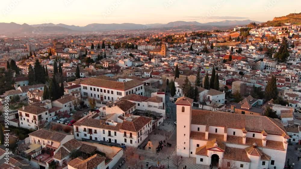 Aerial view of Granada city, Albaicin district at sunset, old Moorish quarter of the city, located on a hill facing the Alhambra. Andalusia, Spain Aerial view of Granada city, Albaicin district at sunset, old Moorish quarter of the city, located on a hill facing the Alhambra. Andalusia, Spain