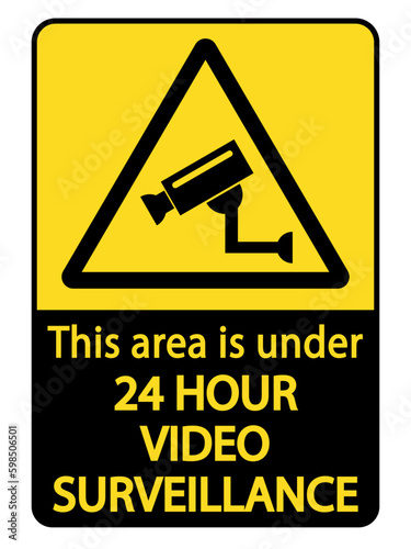 This area is 24 under video surveillance. Warning yellow triangle sign with symbole  an text. 