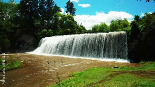 Slow Motion Wide shot of Rere falls waterfall, Gisborne, New Zealand.