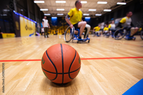 Closeup of basketball ball on the court during wheelchair © Ruslan