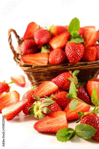 wicker basket with fresh strawberries fruits