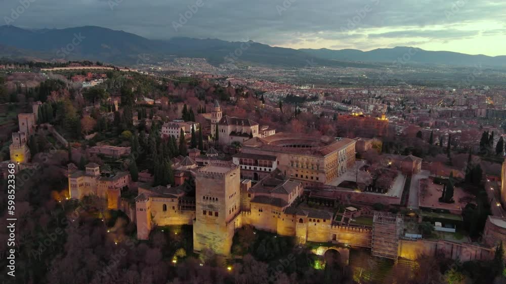 Alhambra palace in Granada, Spain, Islamic medieval castle, aerial view of famous tourist landmark in Andalusia, southern Spain Alhambra palace in Granada, Spain, Islamic medieval castle, aerial view of famous tourist landmark in Andalusia, southern Spain