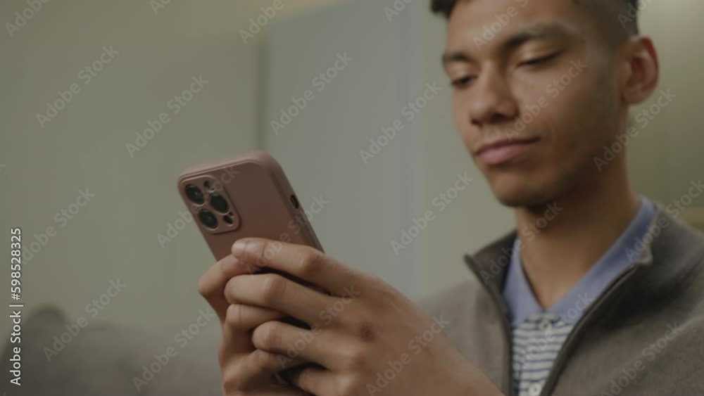 Black Man Using Cellphone. African American man surfing the net using mobile phone close up. Generative AI Black Man Using Cellphone. African American man surfing the net using mobile phone close up. Generative AI