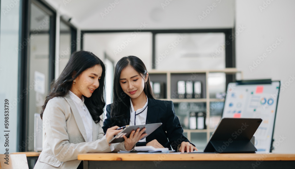 Portrait of success business people working together in home office. Couple teamwork startup concept.. Portrait of success business people working together in home office. Couple teamwork startup concept..