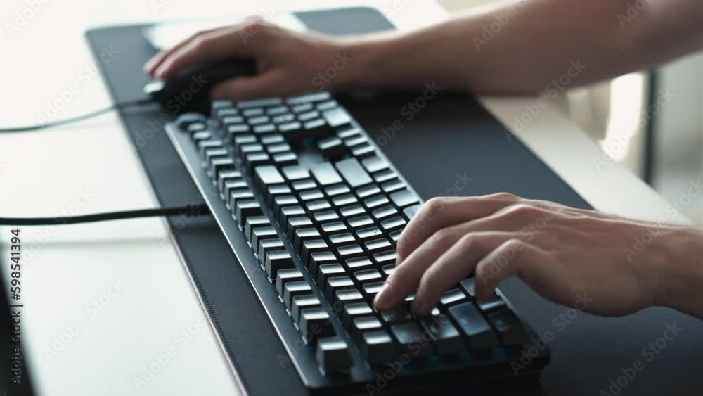 Online work. Computer technology. Unrecognizable man employee hands typing using computer keyboard mouse playing games at office workplace. Generative AI Online work. Computer technology. Unrecognizable man employee hands typing using computer keyboard mouse playing games at office workplace. Generative AI