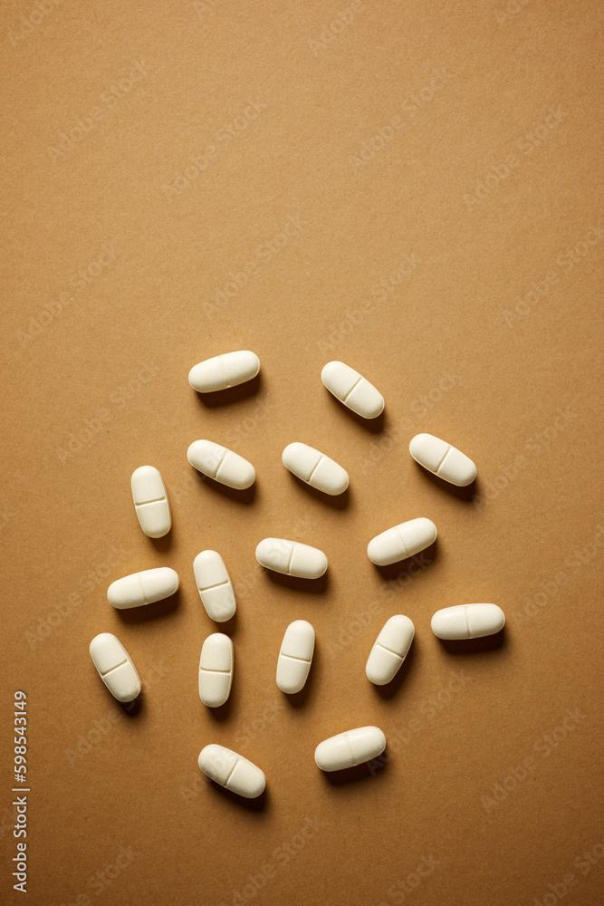 Brown medicine tablets on a table