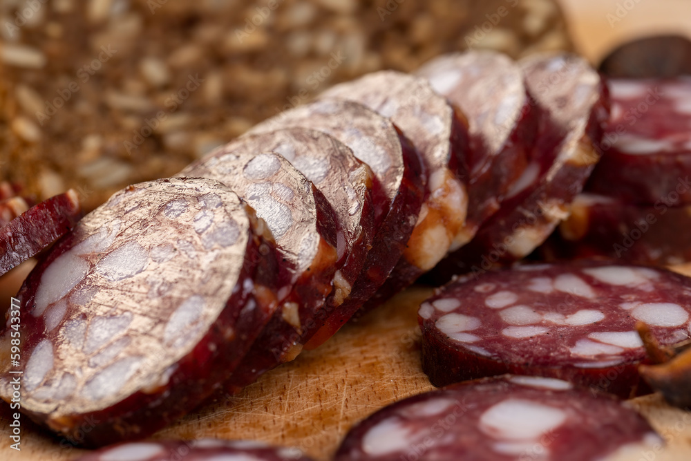 sliced high-quality pork sausage with the addition of lard pieces sliced high-quality pork sausage with the addition of lard pieces