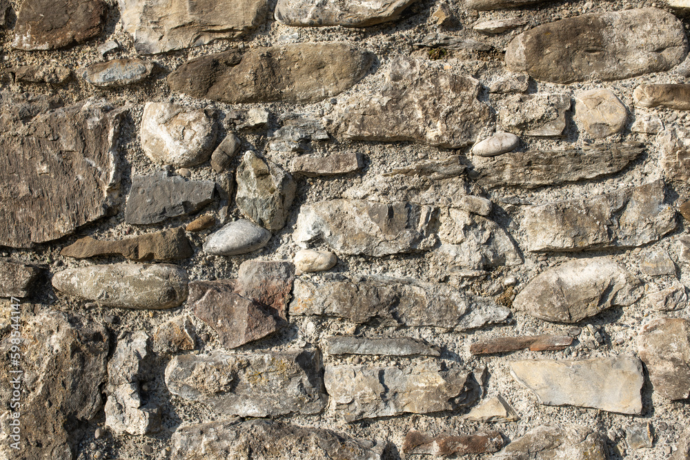 Fototapeta premium Alte verwitterte Steinmauer. 