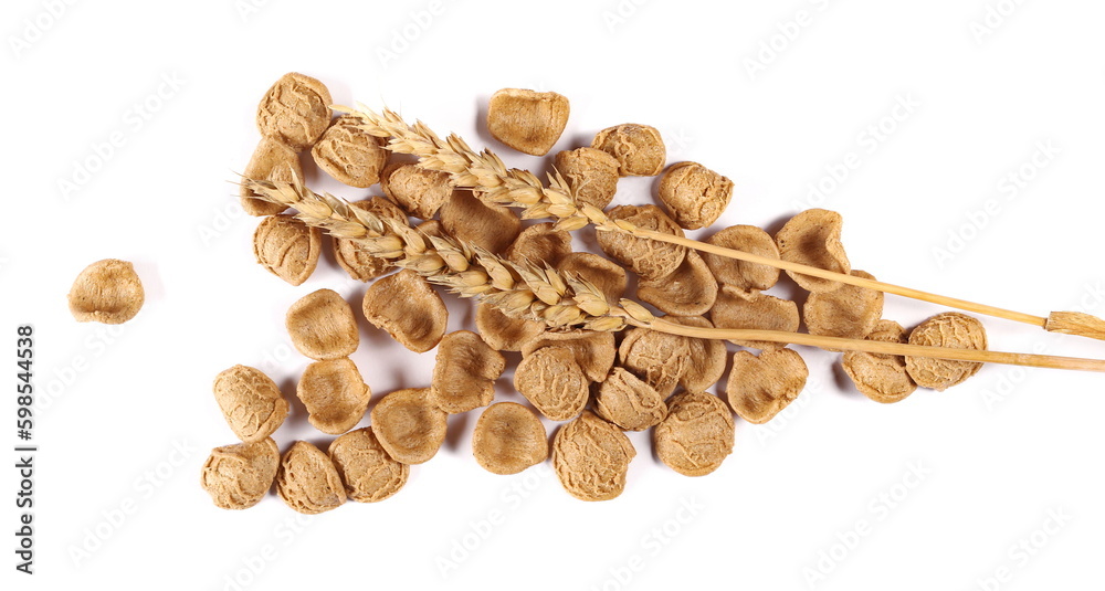 Orecchiette pasta uncooked and ear of wheat isolated on white, top view Orecchiette pasta uncooked and ear of wheat isolated on white, top view