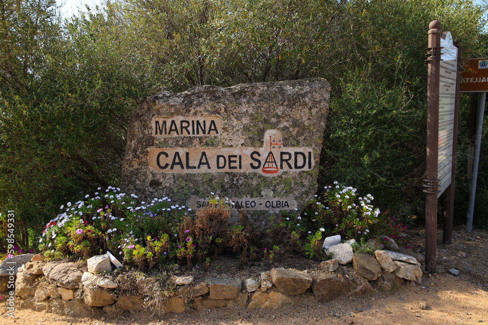 Marina Cala Dei Sardi Written In Stone With Logo, Gulf Of Cugnana 