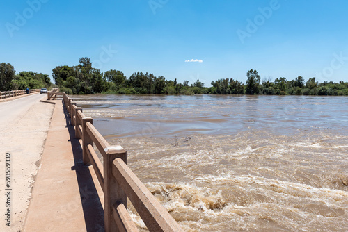 Road bridge over a flooded Orange River at Grootdrink photo