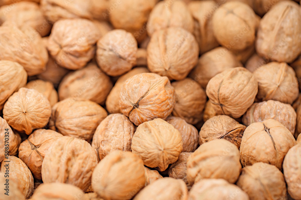 Nuts walnuts whole, in bulk, on supermarket, selective focus