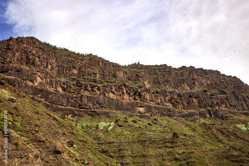 Nature and landscape with volcanic formation mountains in Gran Canaria island. View from the panoramic road, on the mountain ranges of the island of Gran Canaria.