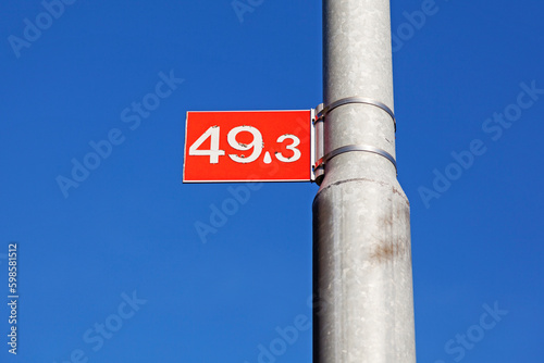 sign with the numbers 49.3 photo