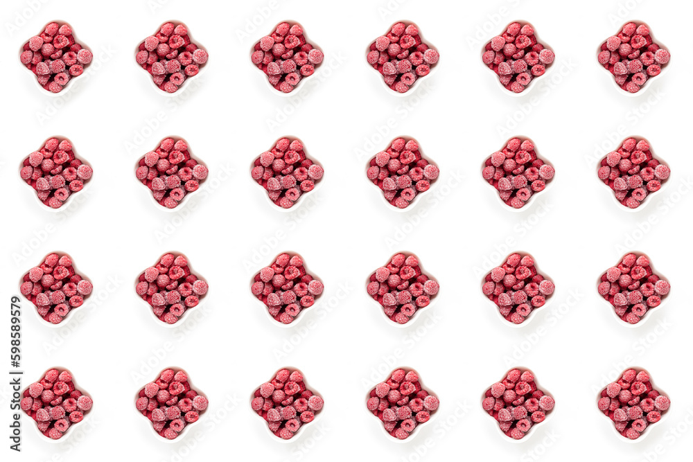 Seamless pattern of frozen raspberry berries in bowls on white background. Top view. Seamless pattern of frozen raspberry berries in bowls on white background. Top view.