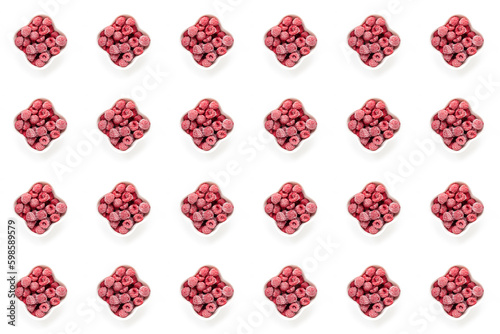 Seamless pattern of frozen raspberry berries in bowls on white background. Top view.