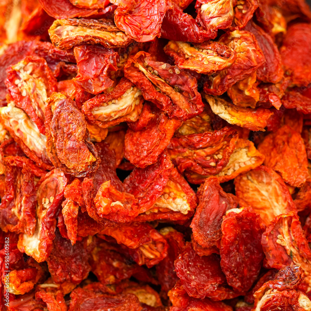 Red dried peppers close-up. Dried vegetables. Healthy food.
Red dried peppers close-up. Dried vegetables. Healthy food.