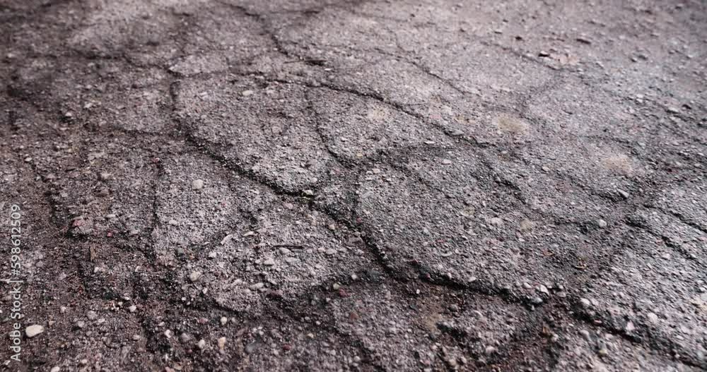 damaged asphalt on a highway, a close-up of an old road with cracks and damage damaged asphalt on a highway, a close-up of an old road with cracks and damage