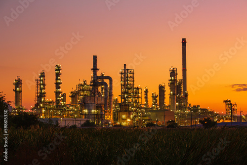Oil    refinery    and     plant and tower column of Petrochemistry industry in oil    and    gas       industrial with    cloud    orange       sky