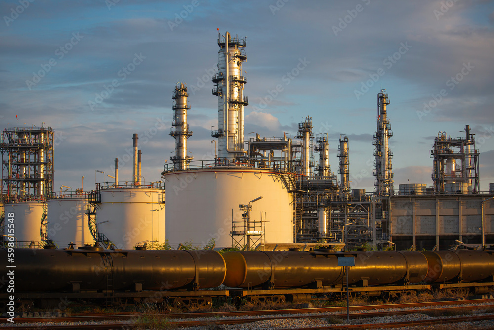 Scene of tank oil refinery plant and tower column of  petrochemistry industry  container on train rail way