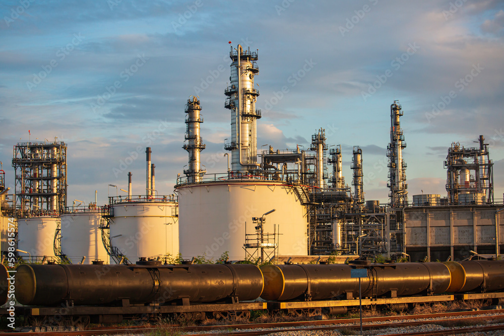 Scene of tank oil refinery plant and tower column of petrochemistry industry container on train rail way Scene of tank oil refinery plant and tower column of petrochemistry industry container on train rail way