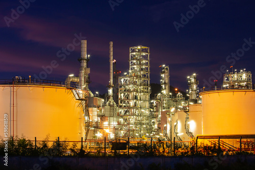 Oil​ refinery​ plant and tower column of Petrochemistry industry in tank oil​ and​ gas​ ​industrial with​ cloud​